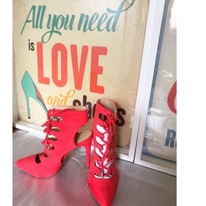 Never worn orange size 8 pumps.